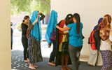 Before entering the mosque at the Sheikh Mohammed Centre for Cultural Understanding, visitors must take off their shoes, and women are asked to cover up with scarves and cloaks. The center keeps a supply on hand.