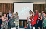 Julie and Barry Karp, ShoreTrips' owners, treat a boardroom of travel advisers to a celebratory toast. A limited number of sellers are accepted into the GTM events; agents who are selected to attend are fully hosted and receive access to one-on-one meetings with suppliers, exclusive boardroom sessions and other networking opportunities.
