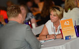 Samarah Meil, right, owner of Amarillo Travel Network, meets with suppliers during GTM West's one-on-one appointments.