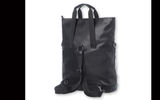 The Moleskine Classic Vertical Weekender Bag has a padded pocket that fits laptops and tablets with up to 15-inch screens; has three carrying options, with its adjustable and removable shoulder strap and webbed handles (backpack, carry or over the shoulder); fits airline carry-on restrictions; has multiple organizer pockets, Including an external zippered pocket; and is water resistant. And like other Moleskine brand bags, it looks great.