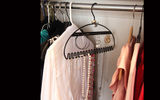 Looking like an ordinary closet hanger with delusions of grandeur, this handy product is designed to store earrings, necklaces, bracelets and rings, all while keeping them untangled, easy to access and somewhat hidden from prying eyes. Made of steel, in three colors and in two sizes, the space-saving Hang It Jewelry Organizer helps minimize tarnish and scuffing by effectively separating your valuables.