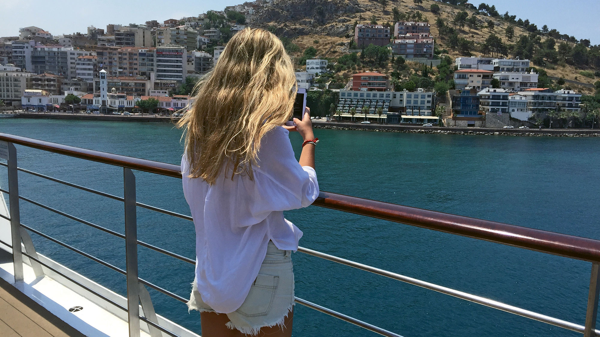 The author’s daughter, Chloe, enjoying her first view of Kusadasi, Turkey, from the deck of the Celestyal Odyssey.