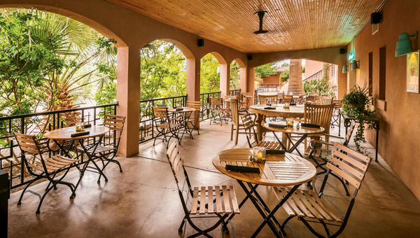 An outdoor dining area at the Sierra Grande Lodge and Spa. An outdoor dining area at the Sierra Grande Lodge and Spa.