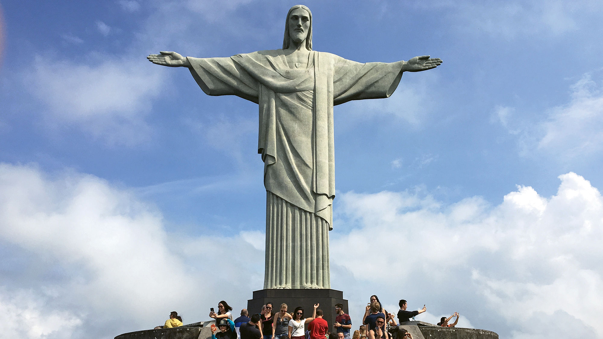 Visitors flock to Rio de Janeiro’s Corcovado (Christ the Redeemer) statue, which sits 2,330 feet above the Atlantic.