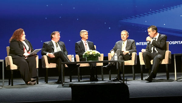 NYU's Kristin Lamoureux moderates a panel with, from left, Choice Hotels' Stephen Joyce, Hilton's Christopher Nassetta, IHG's Richard Solomons and Marriott International's Arne Sorenson at the NYU hospitality conference. NYU's Kristin Lamoureux moderates a panel with, from left, Choice Hotels' Stephen Joyce, Hilton's Christopher Nassetta, IHG's Richard Solomons and Marriott International's Arne Sorenson at the NYU hospitality conference.