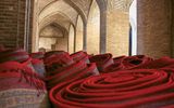 Rolls of beautifully handcrafted Persian rugs were for sale outside Isfahan's bazaar.