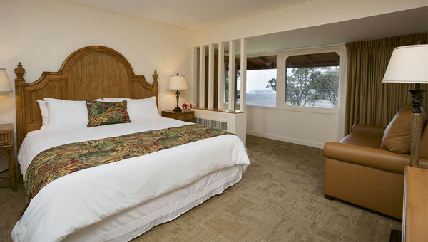 A deluxe room at the Volcano House hotel in Hawaii Volcanoes National Park, with a view of Halemaumau.