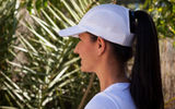 Made for women, this chapeau has a wide band on the back the literally lifts one's hair off the neck, keeping you cool and comfortable on the summer's warmest days. No Velcro or buckles with this hat, which accommodates women with either short or long hair. In addition to fitting comfortably and available in white, black and pink, the Hytail fits easily in a purse, workout bag, glove compartment or pocket.