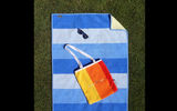 The primary selling points of this unique cotton beach towel are that it is waterproof, which is unique in itself, and ''anti-sand,'' which is supposed to indicate that the product's nylon base backing has ''loop-less'' fibers that sand will not stick to. Pick up the towel from the beach and, according to Sandusa, it will be sand free. In addition, because it is constructed to be waterproof, the beach towel can also be used to wrap your wet gear, protect car seats after a day at the beach or protect electronic gear from a sudden rain storm.