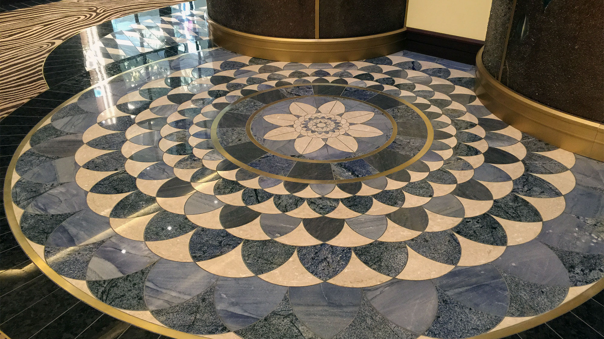 This floor design in the atrium is an example of some of the intricate marble patterns on Seven Seas Explorer.
