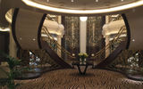 The 750-passenger Seven Seas Explorer, to be christened July 13, has been billed by Regent Seven Seas Cruises as 'the most luxurious ship ever built.' The lobby features this elaborate double staircase.