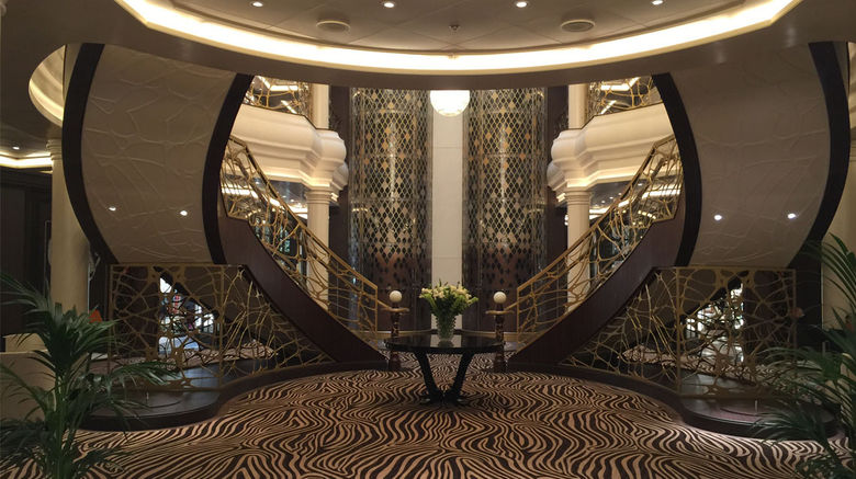 The 750-passenger Seven Seas Explorer, to be christened July 13, has been billed by Regent Seven Seas Cruises as 'the most luxurious ship ever built.' The lobby features this elaborate double staircase.