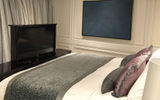 Some of the suites have TV sets in the bedrooms that emerge and disappear from a console at the foot of the bed.