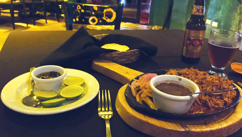 Cochinita pibil is one of the signature dishes of the Yucatan Peninsula.