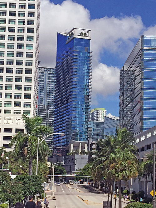 The sleek East Miami building is part of the larger Brickell City Center, a mixed used development featuring condos, office space and an upscale, open-air mall. The sleek East Miami building is part of the larger Brickell City Center, a mixed used development featuring condos, office space and an upscale, open-air mall.