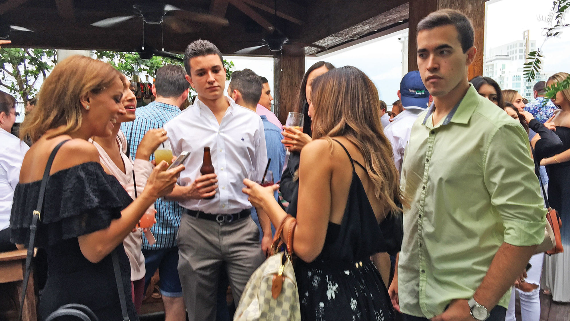 East Miami's rooftop Sugar lounge is packed on a recent Friday evening.