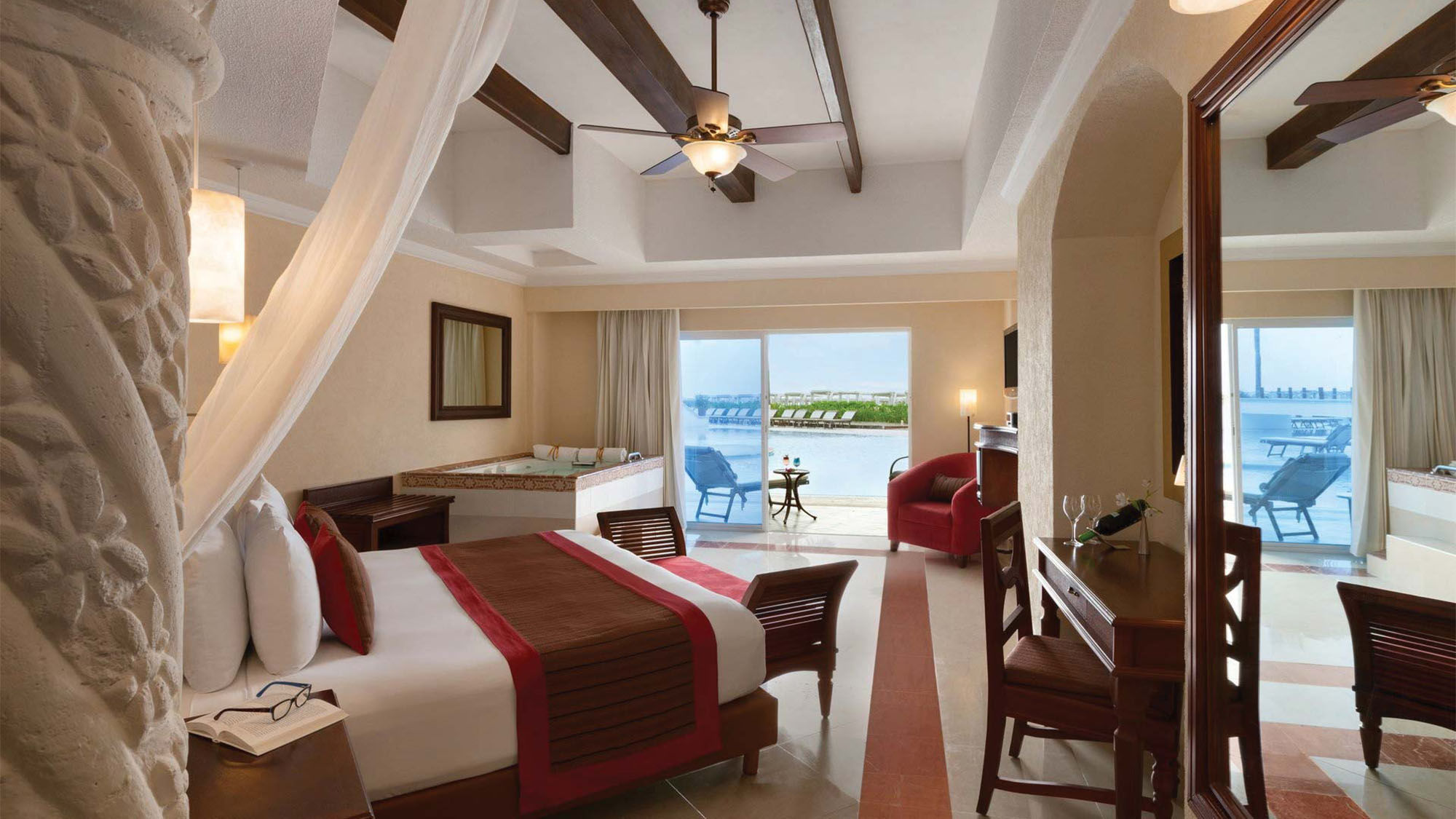 A Royal Junior Suite with a swim-up ocean view, which has a private entrance into the resort’s pool.