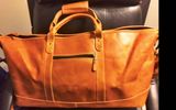 Still another exceptional piece of luggage to consider is this carry-on-sized bag with a huge main compartment that will easily accommodate two to three days' worth of clothing and necessities. As striking-looking as it is practical, the Canyon Little River Duffel, which is designed to have unisex appeal, is made of full-grain buffalo hide with a full-leather bottom, five antique brass feet (no rollers on this one) and a rugged lining. Meant to be carried, the bag has a padded, nonslip detachable shoulder strap and comfortable handles.