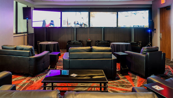 The D Las Vegas offers "man cave" suites like this one for hosting fantasy football draft parties. The D Las Vegas offers "man cave" suites like this one for hosting fantasy football draft parties.