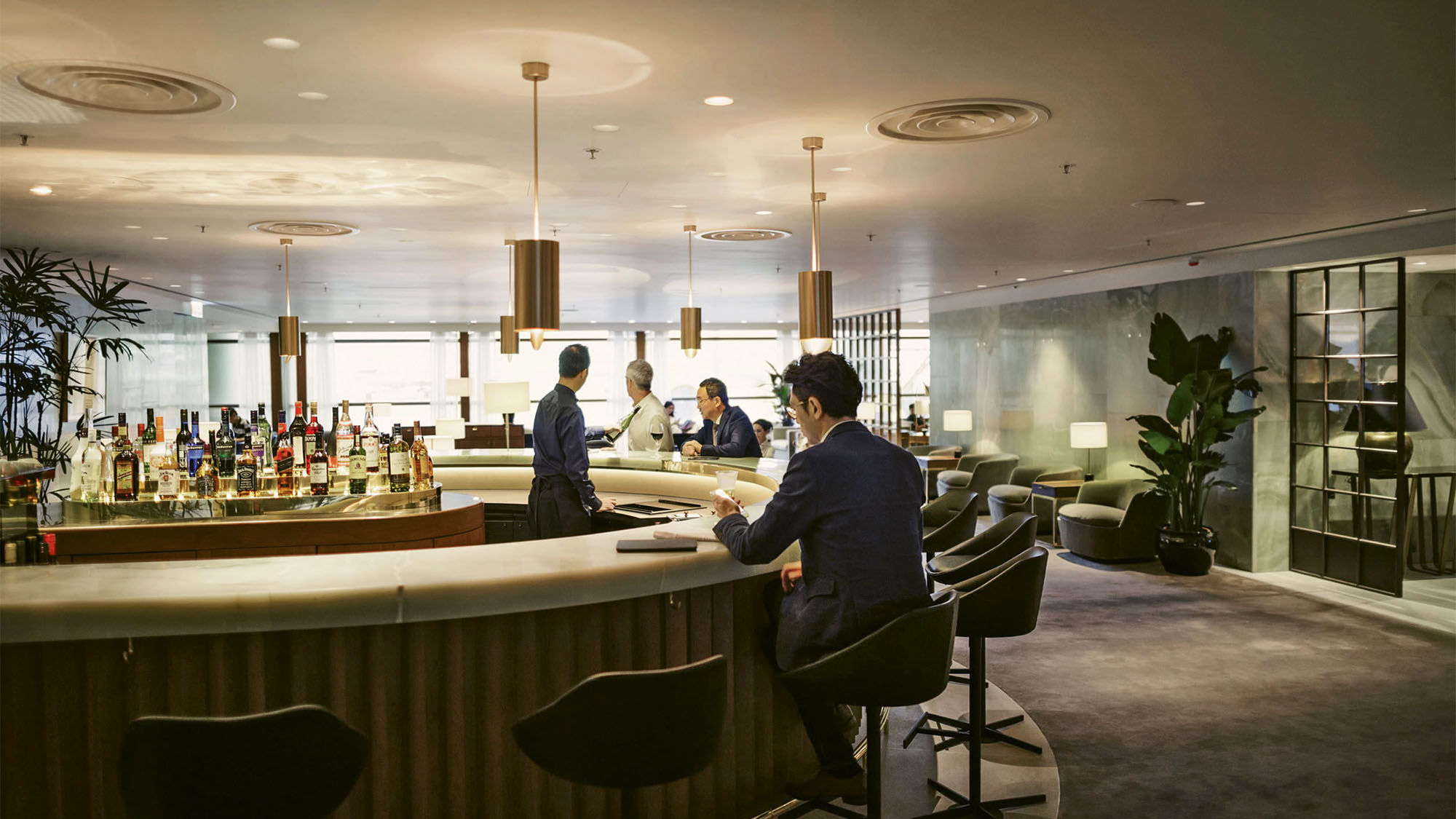 Cathay Pacific’s business-class lounge in the Pier at Hong Kong Airport has a full-service bar among its amenities.