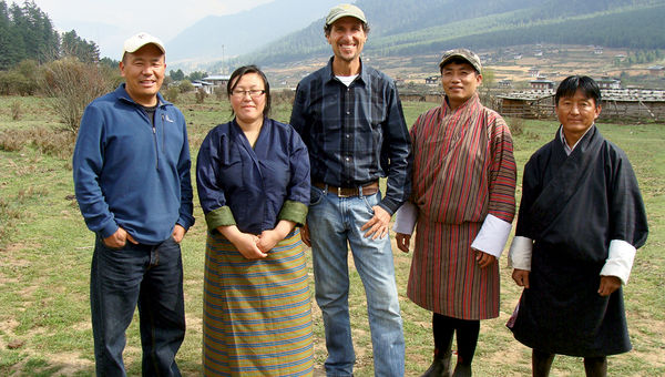 Costas Christ of Virtuoso (center), is working with local community leaders in Bhutan on a national sustainable tourism plan for the Himalayan kingdom.