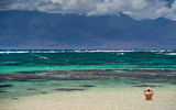 In the surf off of Shipwreck Beach.