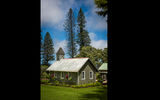 A traditional building on the property of the Four Seasons Resort Lanai, the Lodge at Koele.