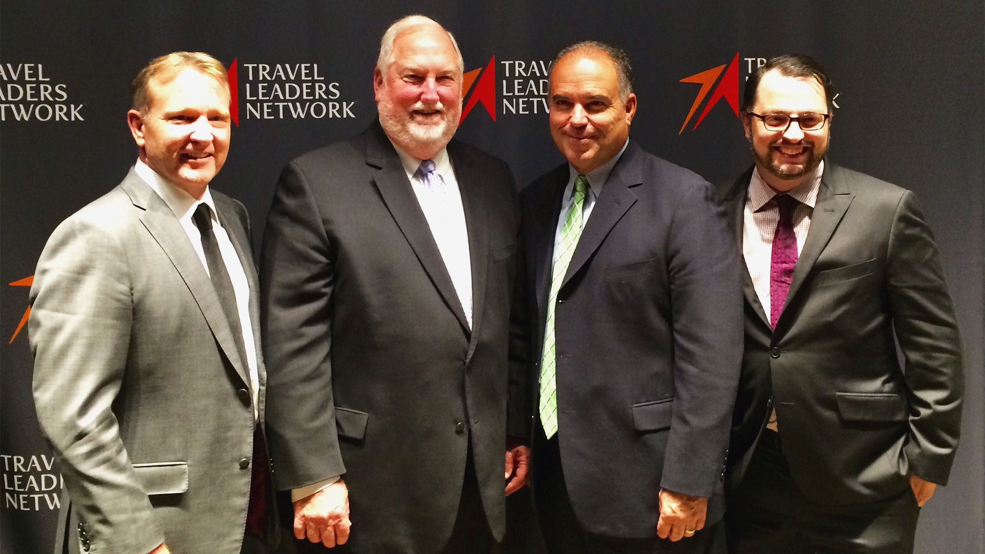 From left, Travel Leaders Group's John Lovell, Roger Block, Stephen McGillivray and Jose Ferreira during Tuesday's announcement that the company is consolidating agent organizations.