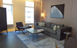 Living room of the 10th floor Hudson Suite  at the Four Seasons Hotel New York Downtown.