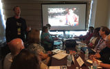 Eduardo Cartaya of G Adventures gives a presentation to approximately a dozen agents during one of the show's small-group supplier breakouts.