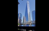 One World Trade Center, which opened in November 2014, with the September 11 Memorial in front of it.