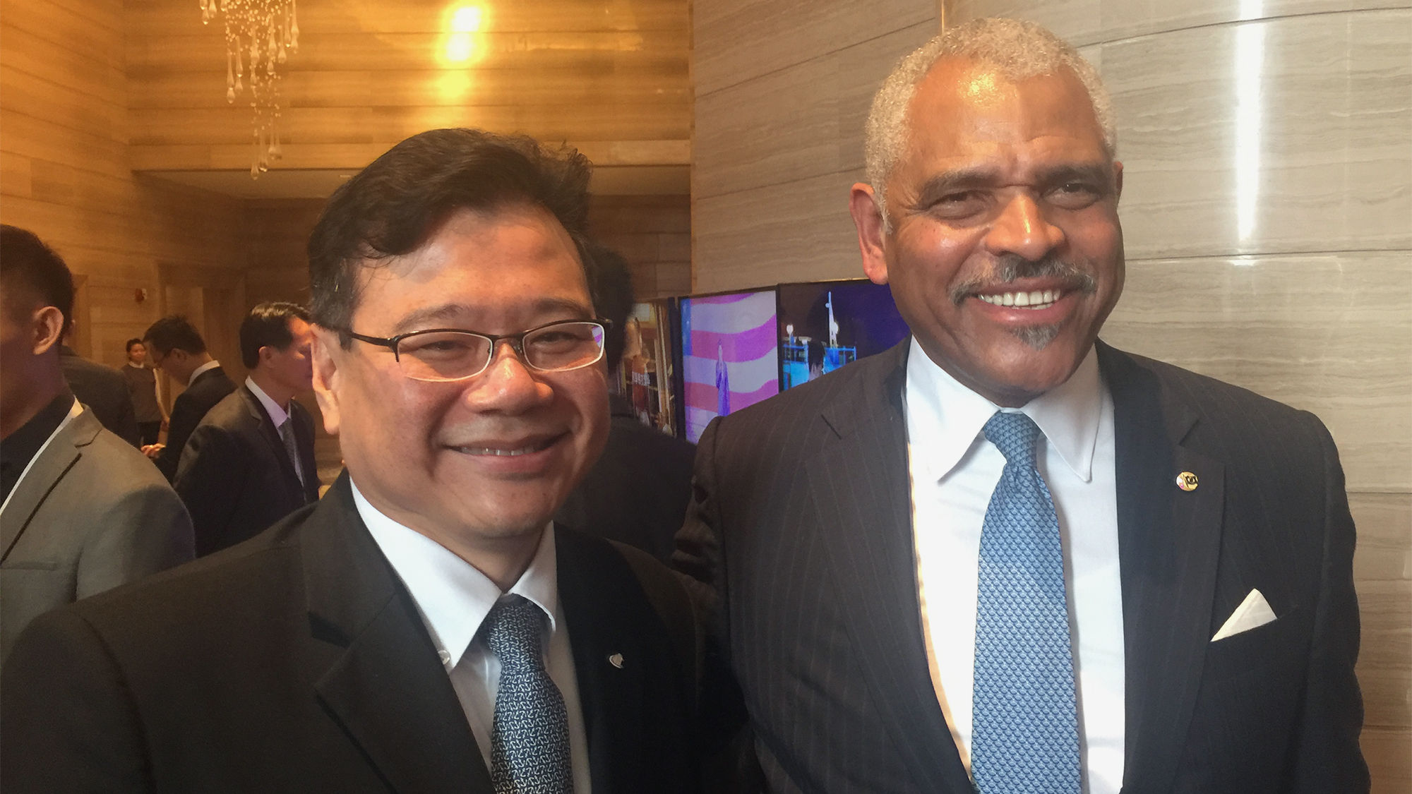 Buhdy Bok, left, president of Costa Group Asia, and Carnival Corp. CEO Arnold Donald at the China Cruise and Yacht Industry Association conference, after Donald announced an agreement to build ships in China.
