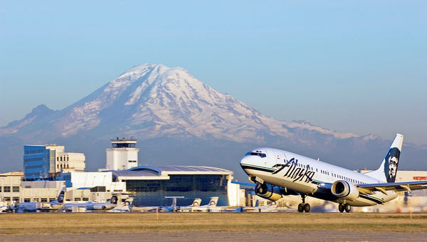 The runway at Seattle-Tacoma Airport. Although the airport is similar to San Francisco in passengers served and distance for domestic flights, the average trip out of SeaTac costs $60 less. The runway at Seattle-Tacoma Airport. Although the airport is similar to San Francisco in passengers served and distance for domestic flights, the average trip out of SeaTac costs $60 less.
