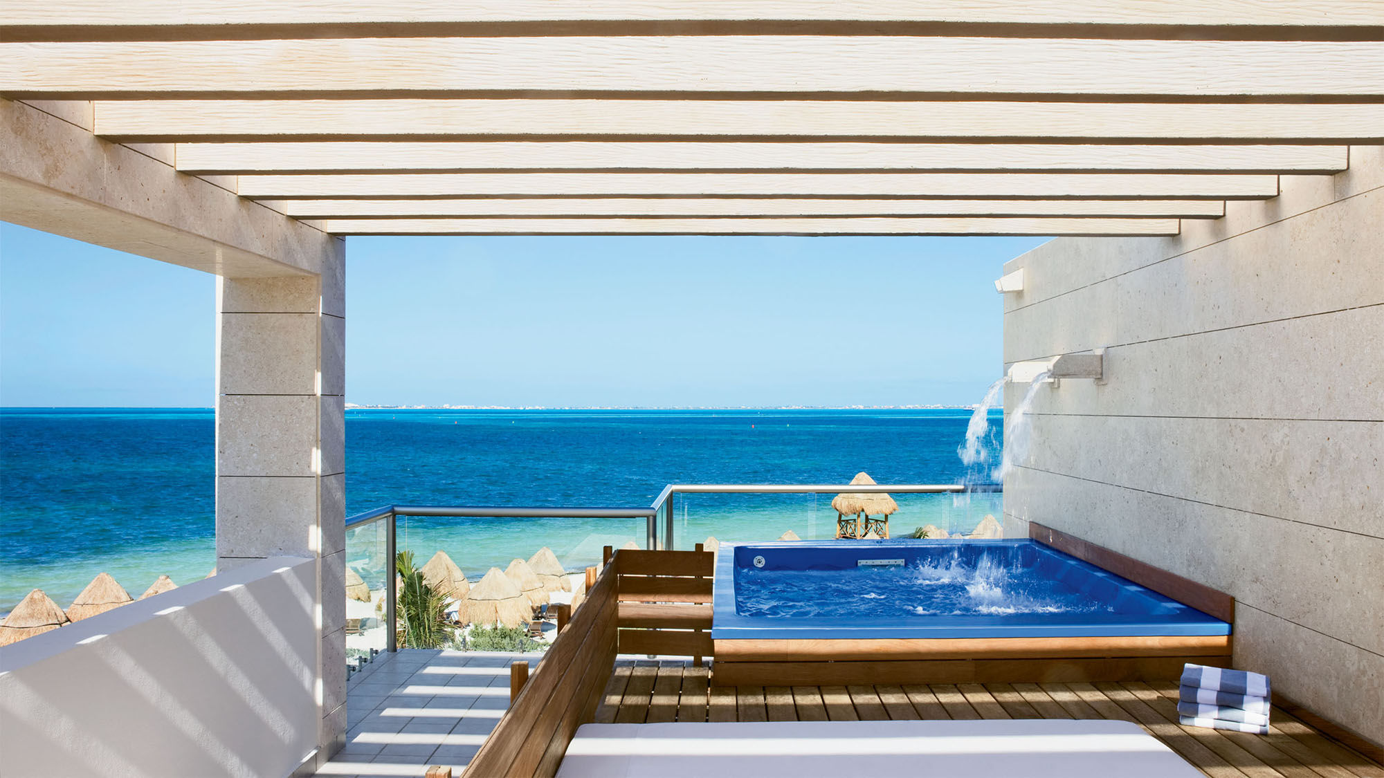 A two-story, beachfront casita at Beloved Playa Mujeres.