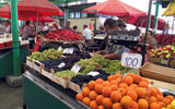 For 100 dinars (less than a dollar), you can buy more than two pounds of oranges at a Belgrade farmers market.
