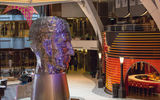 ''Head,'' which was installed on the Harmony of the Seas' indoor promenade, was created by David Cerny, weighs five tons and has motors to move multiple plates on its surface. Capuzzo said the theme is ''pertinent to the world we live in. It's also whimsical.''
