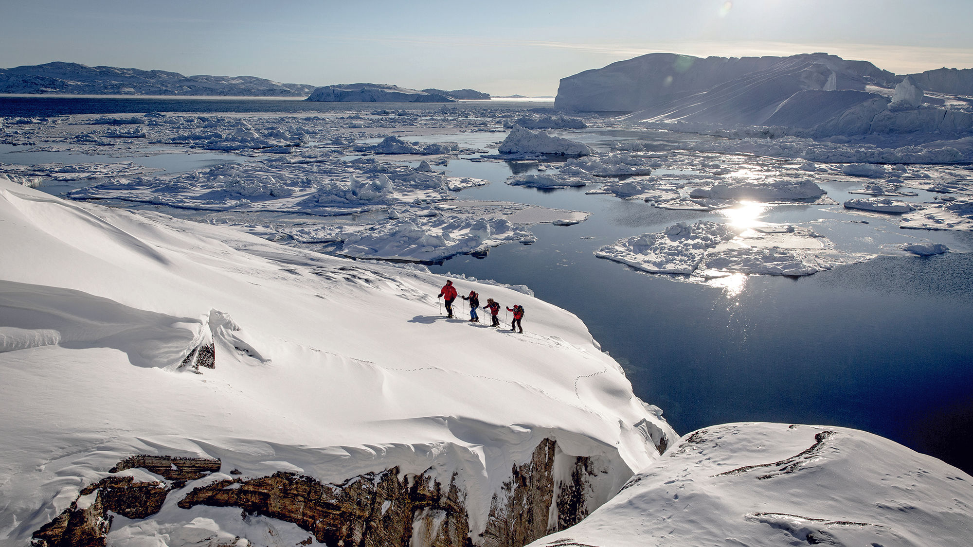 Snowshoeing near Sermermiut on the edge of the Ilulissat ice fjord in Greenland.