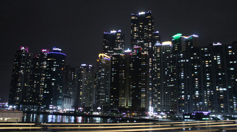 At the invitation of the Korea Tourism Organization, destinations editor Eric Moya recently spent a week in South Korea, experiencing several of the country's fall festivals. Pictured here, Busan as seen from the Rooftop Lounge of the city's Bay 101 arts/entertainment complex.