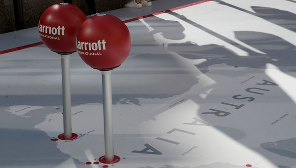 Large push pins were RFID-enabled so loyalty program members could swipe key cards against them, entering them in a sweepstakes.