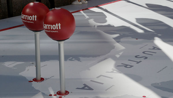 Large push pins were RFID-enabled so loyalty program members could swipe key cards against them, entering them in a sweepstakes. Large push pins were RFID-enabled so loyalty program members could swipe key cards against them, entering them in a sweepstakes.
