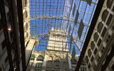 A view of the nine-story atrium's glass ceiling and its iconic tower housing the Bells of Congress, making the hotel the second-tallest structure in the capital, after the Washington Monument.
