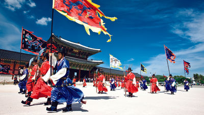Seoul’s Gyeongbokgung Palace features a changing of the guard in traditional costumes.