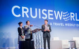 Rebecca Zhang, the group publisher, China, for Northstar Travel Group (Travel Weekly’s parent company) with Zheng Weihang, the executive vice president and secretary general of the China Cruise and Yacht Industry Association and Travel Weekly editor in chief Travel Weekly during CruiseWorld’s general session welcome address Wednesday.