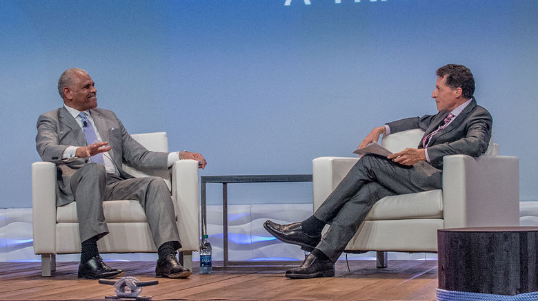 Carnival Corp. CEO Arnold Donald, left, and Travel Weekly editor in chief Arnie Weissmann took the stage on the opening day of CruiseWorld 2016 for the CEO Conversation session. The show, which opened Nov. 9 in Fort Lauderdale, spans three days of agent seminars, executive panels, a trade show and other events.