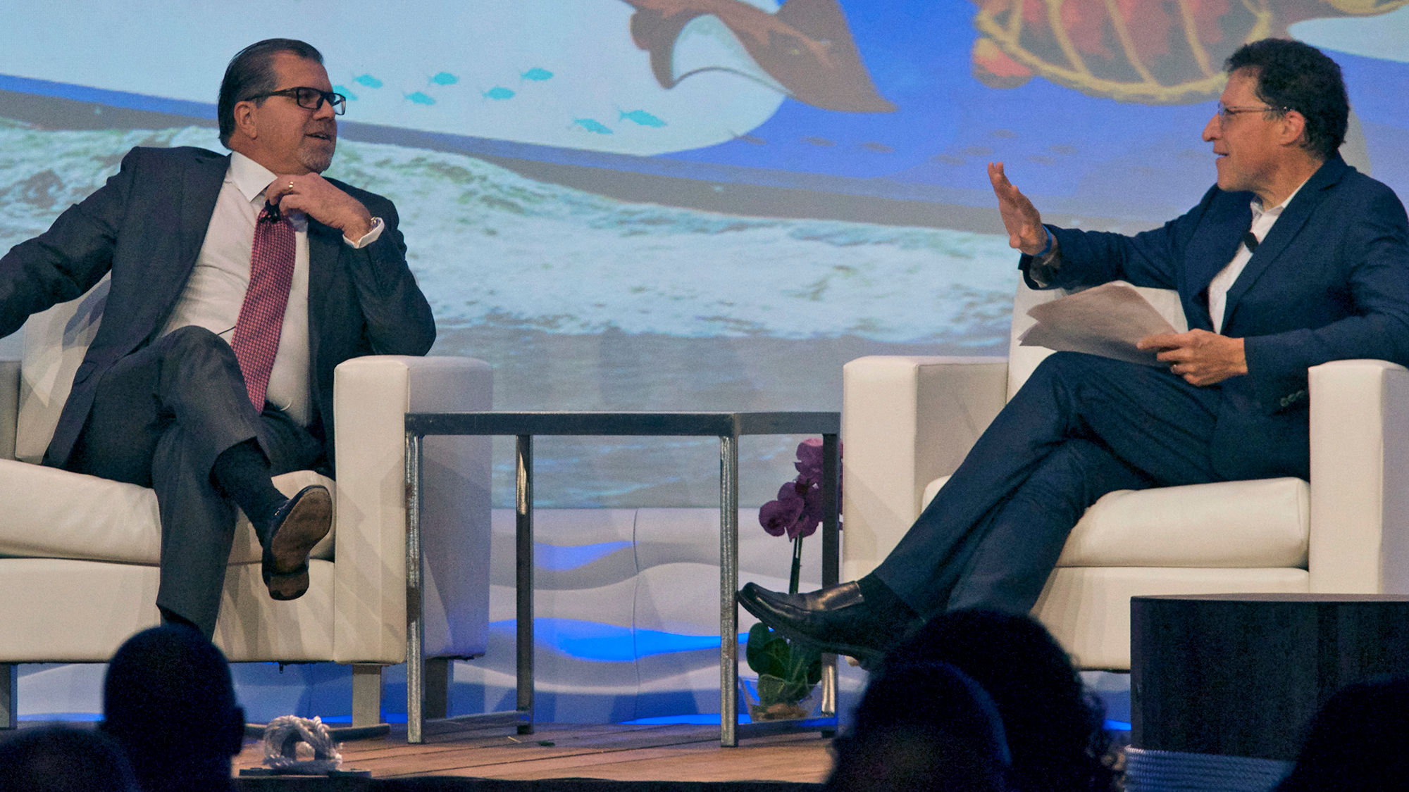 Norwegian Cruise Line Holdings chief Frank Del Rio, left, with editor in chief Arnie Weissmann onstage at CruiseWorld.