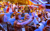 CruiseWorld travel agents, meanwhile, gathered in the Harmony's Studio B for the private viewing launch party. Champagne was served, and agents were able to watch the proceedings on a giant screen.