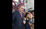Royal Caribbean Cruises Ltd. chairman Richard Fain with godmother Brittany Affolter, a South Florida schoolteacher, before the ceremony began.