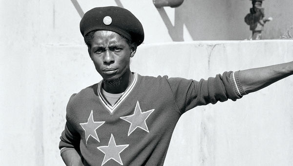A man known as "Bigs," shown here in Kingston, was Tosh's road manager during his first solo tour in 1976. A man known as "Bigs," shown here in Kingston, was Tosh's road manager during his first solo tour in 1976.
