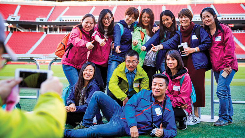 Chinese tour operators during a photo op at Levi's Stadium in Santa Clara, Calif., on a Brand USA-sponsored fam trip.