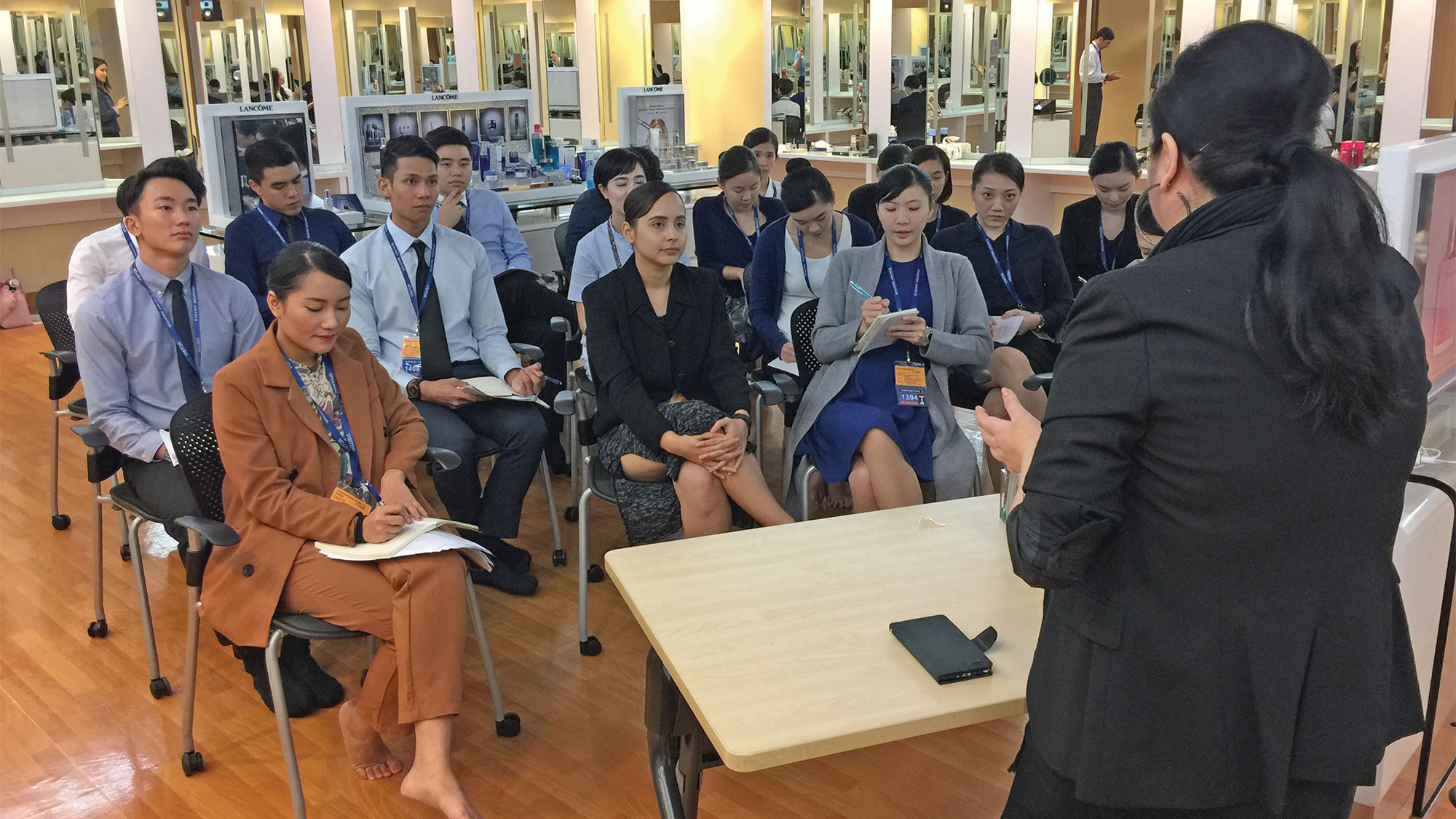 Singapore Airlines trainer Amy Lim gives hygiene and diet tips to a class of cabin staff trainees.